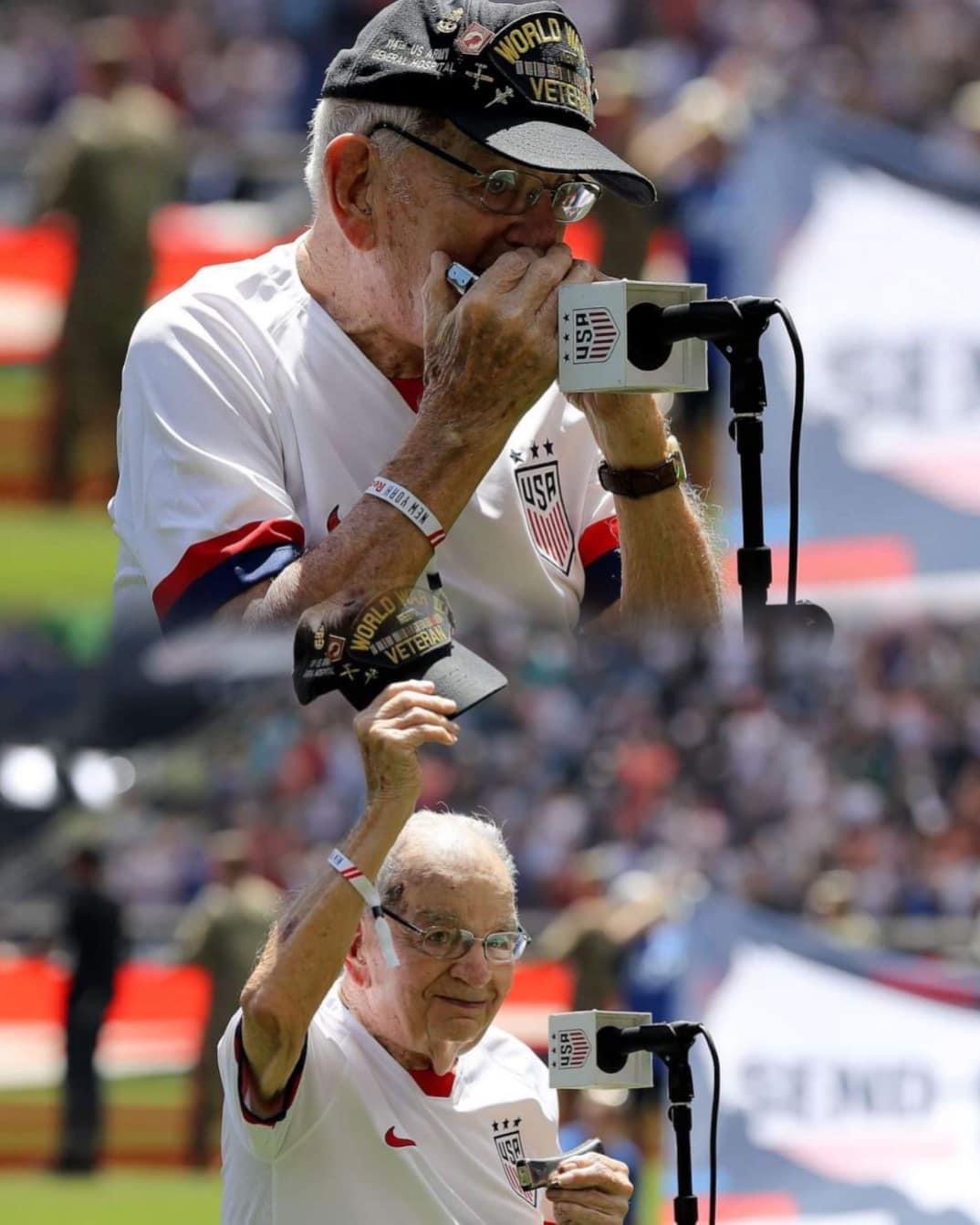 96-year-old WWII veteran brings entire stadium to its feet with humble anthem on the harmonica